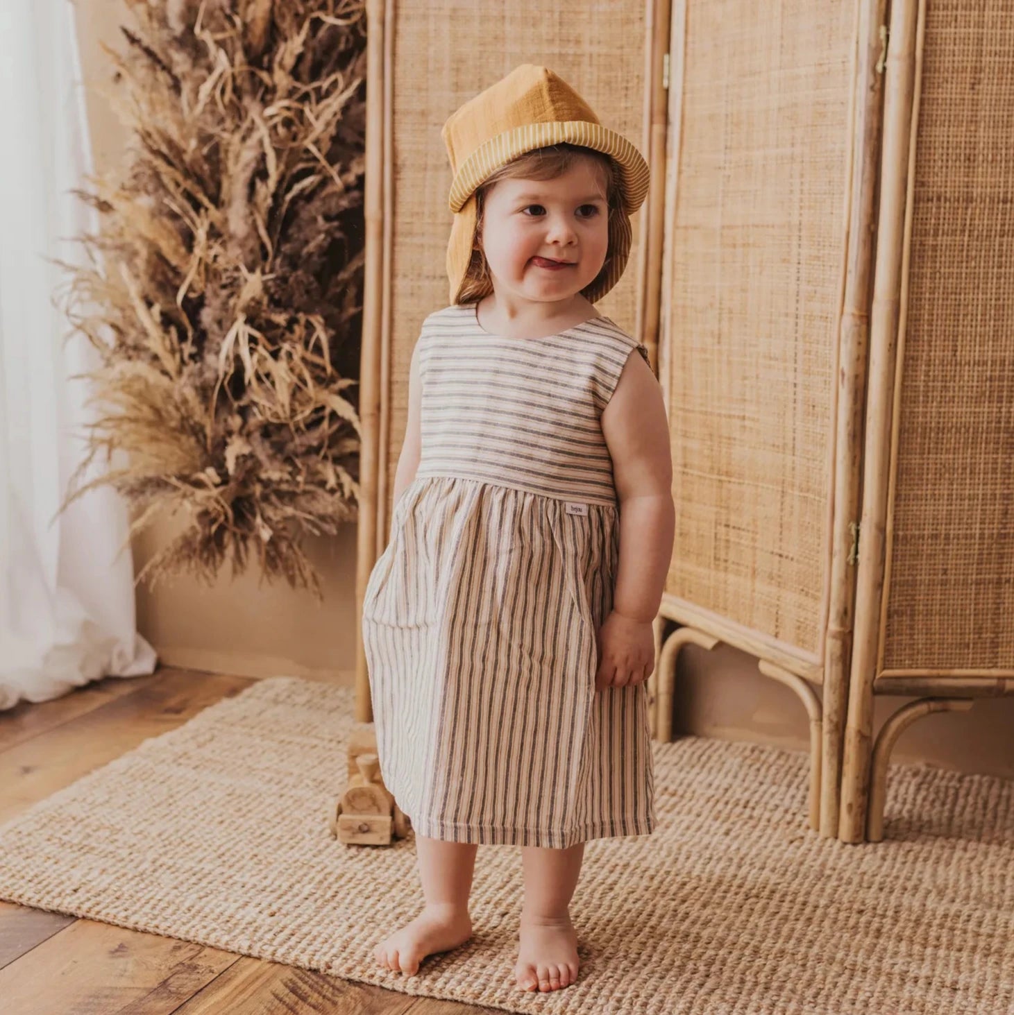 Wende-Sonnenhut Musselin "Curry/Streifen" - 2 in 1